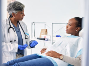 patient and doctor consulting to illustrate preventive care