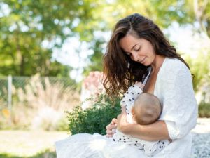 woman nursing baby