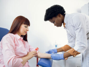 Nurse preparing to take a blood test