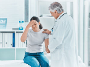 Doctor offering support to a patient to illustrate the topic of blood tests for STDs 