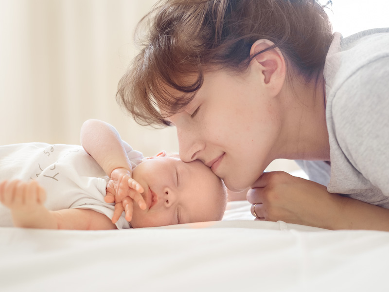 Tender moment of mother and newborn to illustrate the need for a postpartum assessment