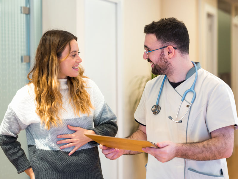 doctor talking to patient to illustrate the concept of having a fertility blood test