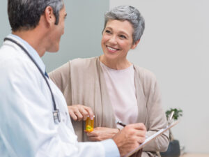 woman and doctor talking about managing overall health with both menopause and diabetes