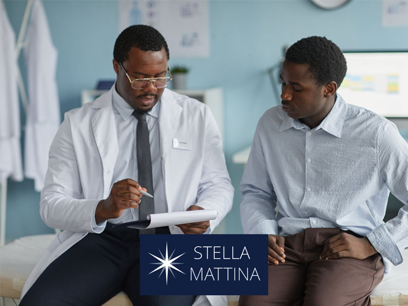 Doctor talking to patient to illustrate explaining iron deficiency and how it differs from anemia