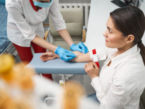 female visiting her doctor for tests to illustrate the possibility of a hormone connection to weight issues