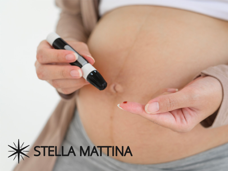 Pregnant woman doing a finger test for blood sugar levels to illustrate untreated gestational diabetes